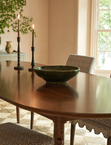 #color::green | Peony green textural terracotta decorative bowl by Heidi Caillier styled on a dining table.
