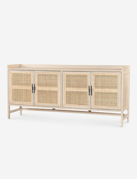 #color::natural | Angled view of the Philene natural mango wood sideboard with cane doors 