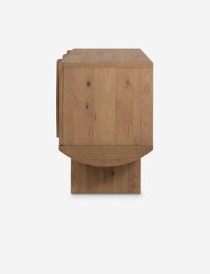 Side view of the Remwald sculptural oak wood low profile media console.