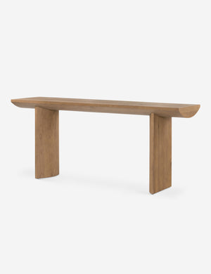 Angled view of the Remwald sculptural oak wood console table.