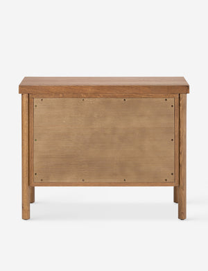 Back of the Kisner natural grain oak nightstand.