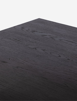 Close up of the Hallen angular leg sculptural dining table.