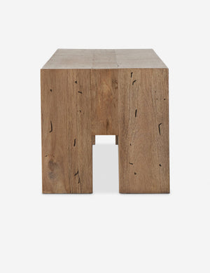 Side view of the Bevan chunky leg distressed wood bench in natural.