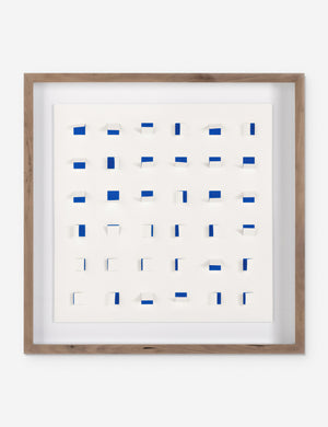 See Through small navy and white wall art featuring square paper cutouts with flaps on a linen backdrop