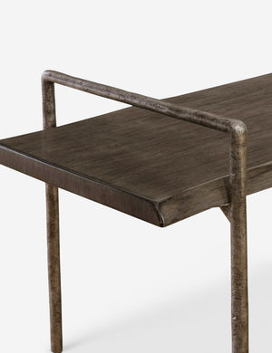 Close up of the Indrani sleek wooden bench with iron frame.