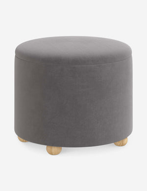 Angled view of the Kamila Steel Gray Velvet 24-inch ottoman