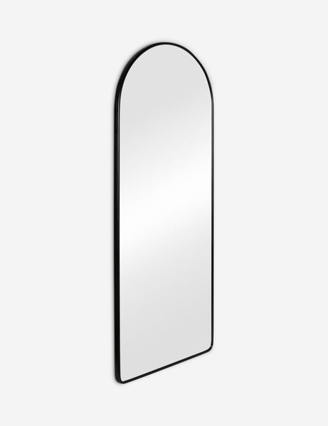 #color::black | Angled view of the Shashenka black arched floor mirror