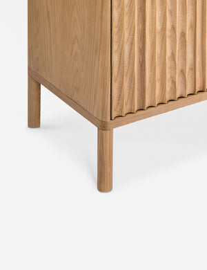 Close up of the Matija marble top, reeded door media console