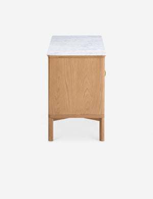 Side profile of the Matija marble top, reeded door media console
