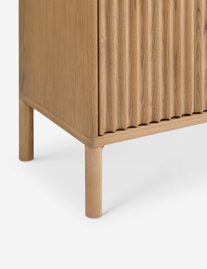 Close up of the Matija marble top, reeded door front cabinet