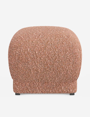 Bailee Blush Boucle upholstered ottoman with a pouf-like design and pleated corners