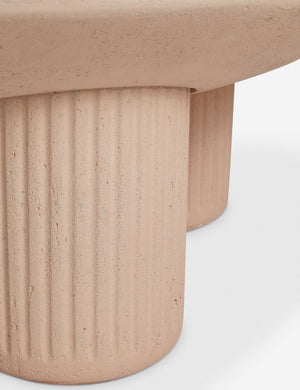 Close up of the base of the Carr modern round fluted base coffee table.