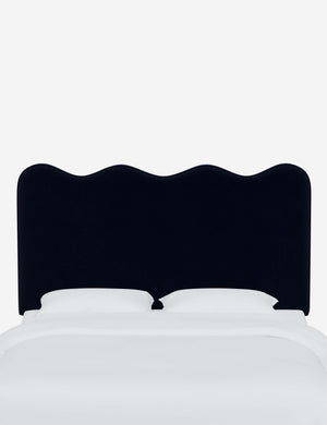 Clementine Navy Velvet Headboard with a scalloped shape at the top