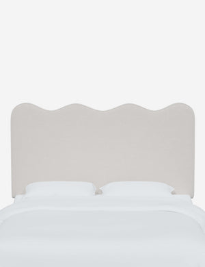 Clementine Snow Velvet Headboard with a scalloped shape at the top