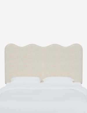 Clementine Talc Linen Headboard with a scalloped shape at the top