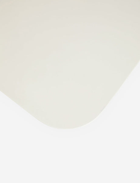 | The rounded corner on the Clouded square white coffee table