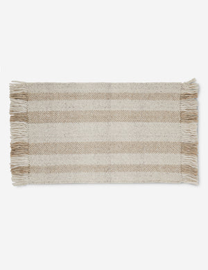 Small Croze handwoven striped fringed outdoor rug.