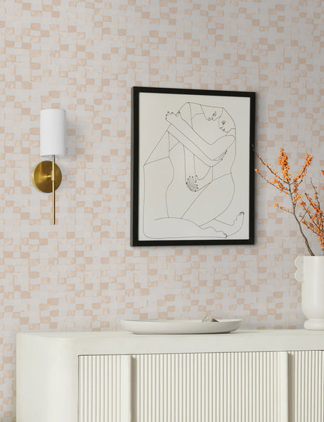 #color::taupe-+-ivory | Taupe and ivory Checkerboard Wallpaper by Sarah Sherman Samuel is in a room with a white console table and an abstract wall art of two people