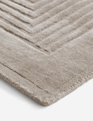 Close up of the corner of the Halden handwoven carved design rug.