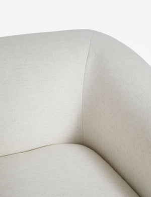 Close up view of the Harlowe softly sculpted plush swivel accent chair.