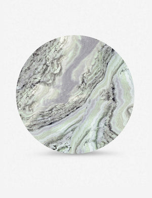 Top of the Celia sculptural round marble dining table.