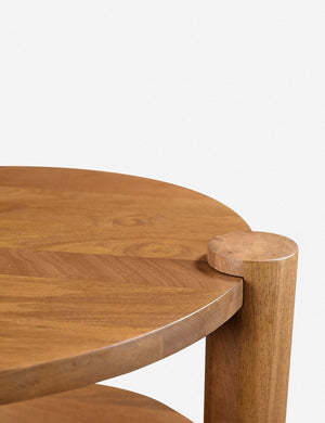 Close up of the Hitchens round rustic wood side table.