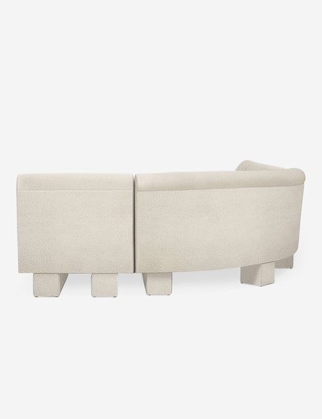 #color::Ivory-Boucle #configuration::left-facing #size::142-W | Rear view of the side of the Lena right-facing white boucle sectional sofa with upholstered beam legs.