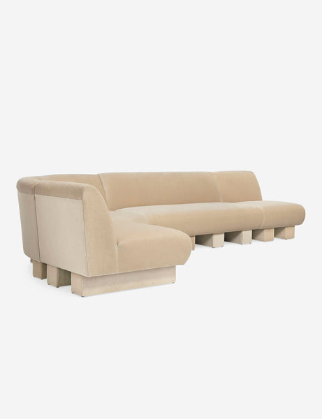 #color::brie-classic-velvet #configuration::left-facing #size::142-W | Angled view of the Lena left-facing beige velvet sectional sofa with upholstered beam legs.
