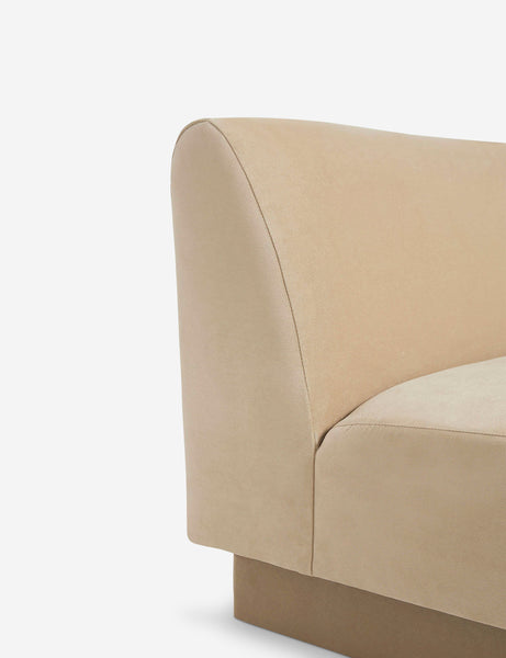 #color::brie-classic-velvet #configuration::left-facing #configuration::right-facing #size::142-W #size::114-W | Side view of the  Centerpiece of the Lena beige velvet sectional sofa with upholstered beam legs