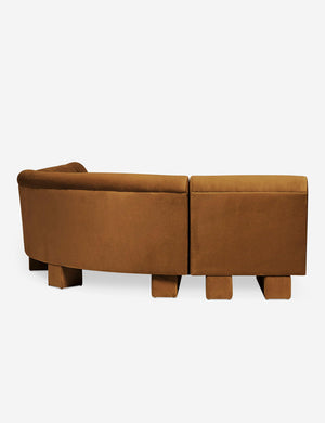 Rear view of the side of the Lena right-facing cognac velvet sectional sofa with upholstered beam legs.