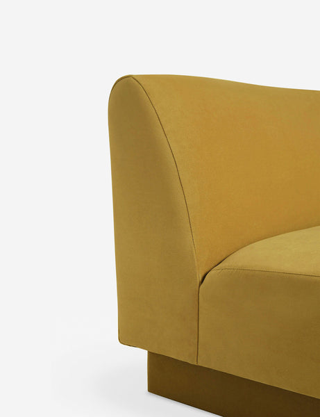 #color::goldenrod-plush-velvet #configuration::left-facing #configuration::right-facing #size::142-W #size::114-W | Side view of the Centerpiece of the Lena yellow velvet sectional sofa with upholstered beam legs
