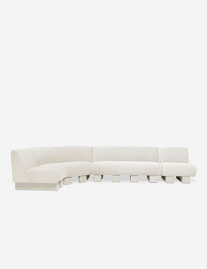 Lena left-facing natural linen sectional sofa with upholstered beam legs.