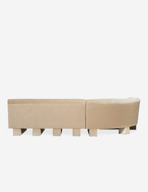 Rear view of the side of the Lena right-facing beige velvet sectional sofa with upholstered beam legs.