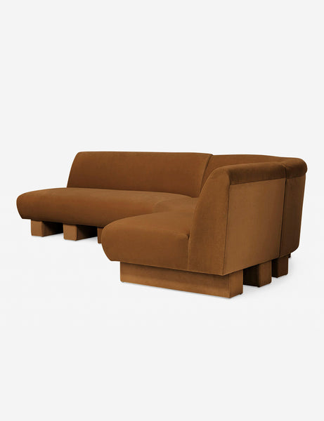 #color::Cognac-Velvet #configuration::right-facing #size::114-W | Angled view of the Lena left-facing cognac velvet sectional sofa with upholstered beam legs.