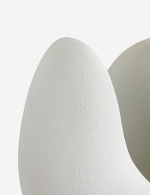Close up view of the Soft Petal matte white floral silhouette table lamp