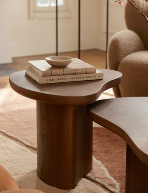 Torino sculptural dark brown nesting coffee table by Aimee Song styled with coffee table books and a catchall dish
