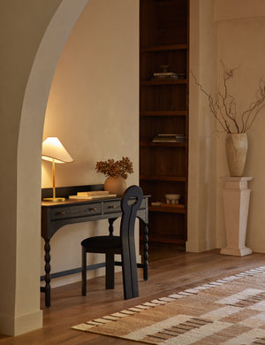 Arroyo Mixed-Material Table Lamp by Elan Byrd styled on a desk.