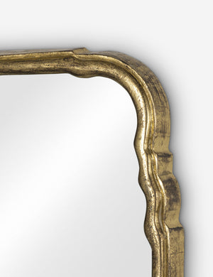 Close up of the frame of the Coudray serpentine gold leaf frame mantel mirror
