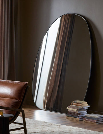 #color::gunmetal | Platero modern oval leaning floor mirror against a wall