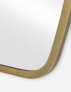 Close up of the Armond crest-shaped slim frame full length mirror