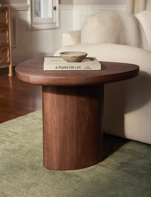 Torino sculptural dark brown nesting coffee table by Aimee Song styled as a side table