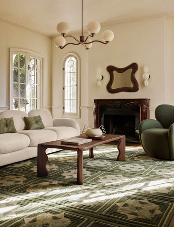 #color::dark-brown | Living room featuring the Grifo wavy sculptural oak coffee table by Aimee Song