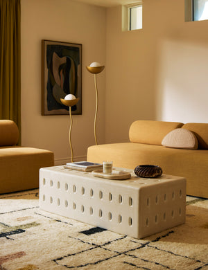Kukka modern two light wavy base floor lamp in brass