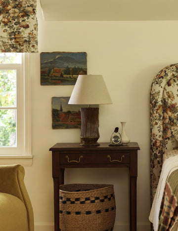 #color::amber | Alta fluted ceramic base table lamp by Heidi Caillier styled on a nightstand