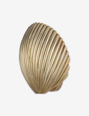 Angled view of the Renoir brass shell-shaped sconce light