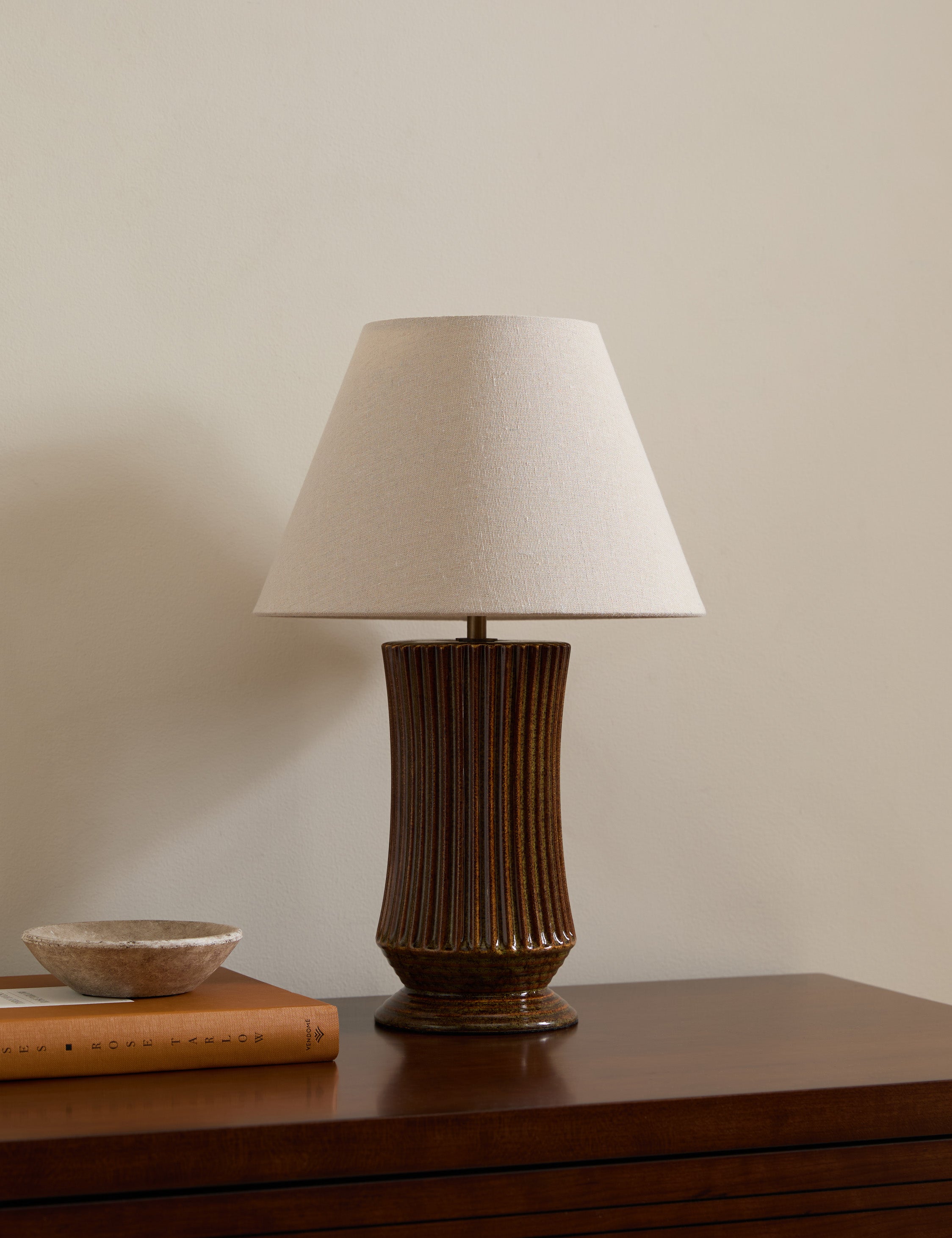 #color::amber | Alta fluted ceramic base table lamp by Heidi Caillier styled on a dresser