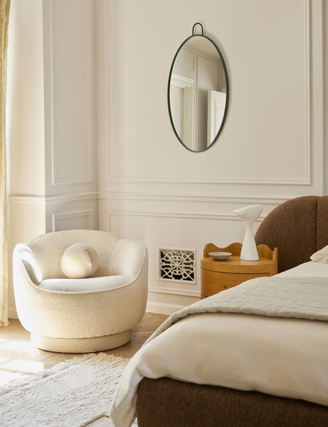 #showall::42894481391715 | Fern scalloped back boucle upholstered swivel chair styled in a corner of a bedroom