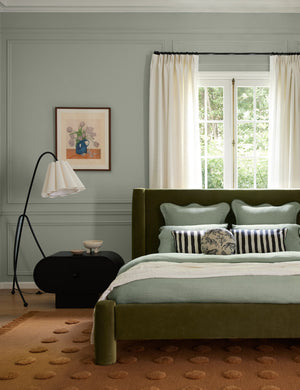 Addie modern fluted shade floor lamp styled next to a nightstand in a bedroom
