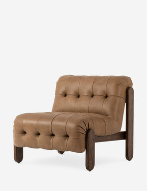 Cantor button-tufted armless leather accent chair.