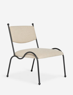 Angled view of the Fidia curved metal silhouette accent chair by Aimee Song